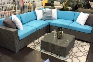 The Kitsilano is the most popular Patio Sectional that Vancouver Sofa carries, shown in grey wicker with aqua blue cushions