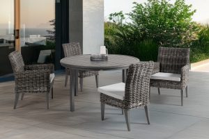 Cubo dining collection ratana on an outdoor patio.